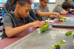 two-pals-cuttin-peppers